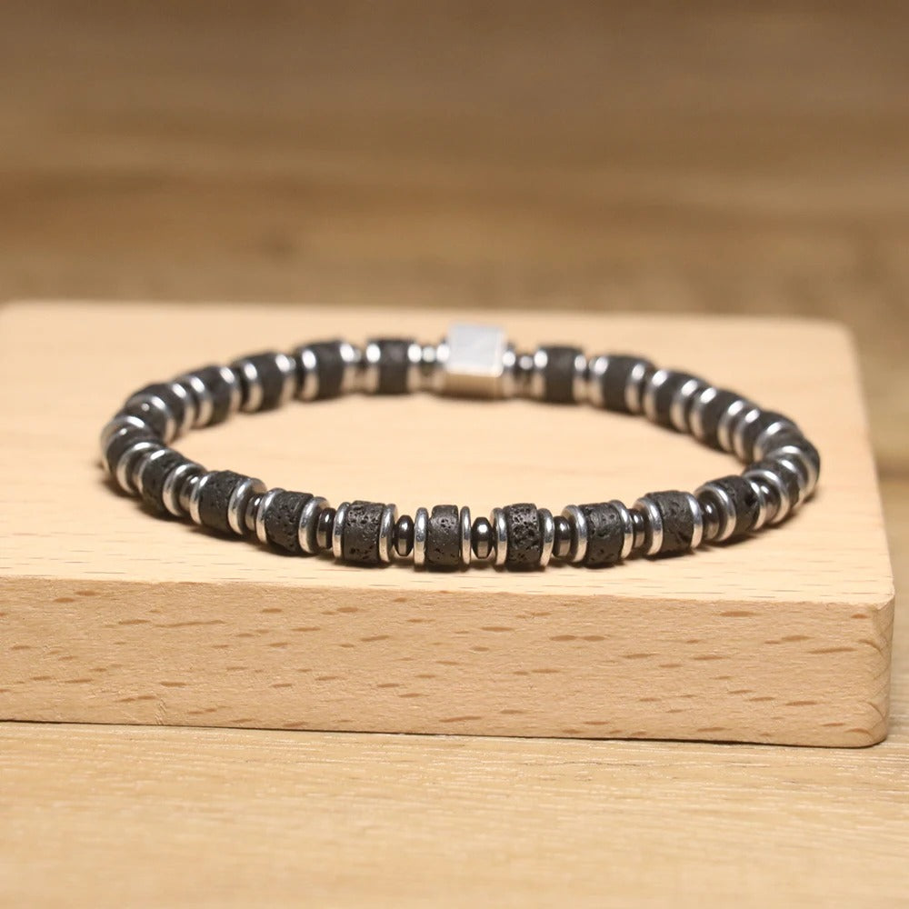 Lava Bead Bracelet with Cube Charm ā Geometric Stainless Steel